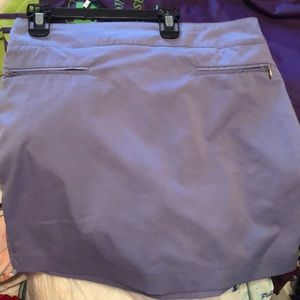 Tennis or golf shirt with shorts built in